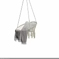 Hanging Double Sofa With Wicker Frame Geometric Pattern Cushions And Gray Blanket