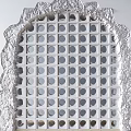 Silver Decorative Wall Decor With Grid Design Circular Patterns And Scalloped Edges