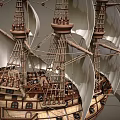 Ancient Wooden Sailing Ship With Multiple Masts White Sails And Flags