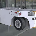White Industrial Utility Vehicle With Large Wheels Yellow Reflective Strips And Red Hook