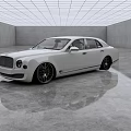 White Luxury Sedan with Black Wheels in Modern Indoor Space on Sleek Reflective Floor