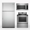 Modern Stainless Steel Kitchen Appliances Including Refrigerator Microwave And Stove