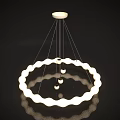 Round White Modern Chandelier With Hanging Spheres And Reflective Black Background