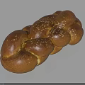 Freshly Baked Golden Brown Braided Bread With Sesame Seeds And Soft Fluffy Texture