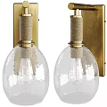 Stylish Brass Wall Lamps With Woven Metal Base And Clear Textured Glass Shades