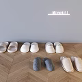 Minotti Slippers In Various Colors Displayed On Wooden Floor For Home Use