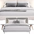 Modern Fabric Double Bed With Gray Pillows Striped Blanket And Side Table