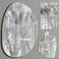 Geometric Shaped Mirrors With Gold Frame Reflecting Interior Plants And Decor