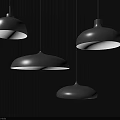 Four Black Dome Shaped Pendant Lights With White Light Hanging Against Black Vertical Striped Background