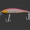 Shiny Pink And Yellow Fishing Lure With Metal Hooks And Clear Reflections
