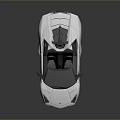 Silver Modern Convertible Sports Car With Open Top And Sleek Exterior Design