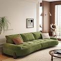 Green Velvet Leisure Sofa Set with Brown White Cushions and Indoor Plant Decor