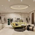 Modern Clothing Store Interior With Clothing Racks Mannequins Green Sofa And Warm Lighting