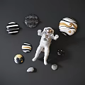 Decorative Wall Decor with Astronaut and Circular Black White Gold Textured Patterns on Dark Background 3d model