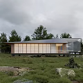 Modern Wooden House Exterior With Large Glass Windows Open Layout And Green Natural Surroundings