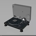 Modern Vinyl Turntable With Transparent Cover And Metallic Tonearm On Dark Base