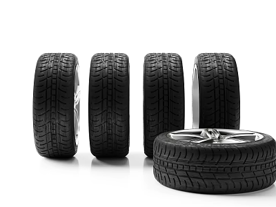 Multiple Car Tires Standing And Lying With Alloy Wheel Rims And Tread Patterns 3d model