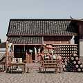 Chinese Traditional Hinged Door in Ancient Market With Tile Roof Wooden Tables And Wine Barrels