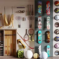 Organized Sports Equipment Wall Display with Variety of Balls Rackets Skateboards and Fitness Gear