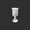 White Ceramic Vessel With Tall Stem And Textured Surface On Black Background