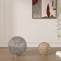 Decorative Ornament Set with Silver Golden Spherical Woven Decor on Wooden Floor and Open Book