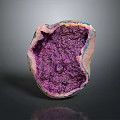 Purple Amethyst Geode With Sparkling Crystals On Dark Display Background