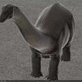 Large Long Necked Reptile Figure With Sturdy Body And Thick Legs On Sandy Ground