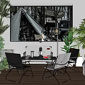 Table And Chair Set With Black And White Chairs Plants Wall Painting And Wooden Floor
