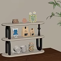 Three Tier Wooden Shelf With Coffee Bags Cups Decorative Items And Green Plant On Cabinet