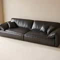 Black Leather Two Seater Sofa With Pillows In Light Colored Room 3d model