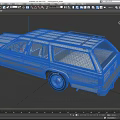 Vintage White Station Wagon With Roof Rack And Classic Silver Body Design