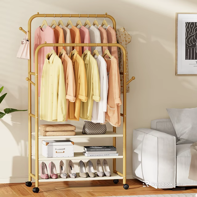 Golden Clothes Rack with Hanging Garments Folded Towels Shoes Storage Boxes and Books 3d model 