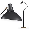Modern Floor Lamp With Black Perforated Lampshade Metal Stand And Brass Accent Details