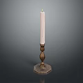 White Candle On Decorative Brass Candlestick With Ornate Pedestal Base