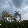 Modern Metallic Spiral Landscape Sculpture With Hollow Design And Light Spots On Grassland