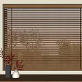 Brown Wooden Window Blinds In Interior Home With Vase And Picture Frame On Sill