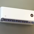 Sleek White Air Conditioner Fan With Digital Temperature Display And Grille Air Outlet