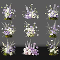 Elegant Purple And White Floral Art Display With Various Designs And Greenery