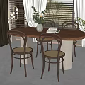 Round Wooden Dining Set With Curved Back Chairs Light Cushions White Vase Green Plants