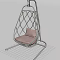 White Woven Swing Chair With Pink Cushion In Green Grass Field