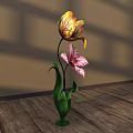 Floral Display with Yellow Tulip and Pink Striped Flower in Green Vase on Wooden Floor