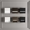Modern Square Lighting Fixtures In Various Colors On Gray Wall