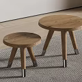 Wooden Round Top Side Tables With Three Legs And Metal Base On Carpet