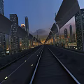 Urban Road Infrastructure With Illuminated Pathway And Modern City Skyline At Dusk