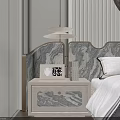 Marble Patterned Bedside Table With Table Lamp Photo Frame And Books In Bedroom