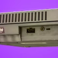 Retro Super Nintendo Entertainment Console With Gray Design Purple Buttons And Controller Ports