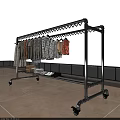 Metal Clothes Rack With Wheels Hanging Various Clothes On Balcony Blue Sky Background