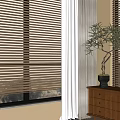 Modern Beige Window Blinds With White Curtains And Wooden Chest In Interior