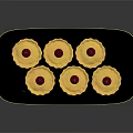 Six Delicious Yellow Tarts Topped With Red Cherries On Black Plate