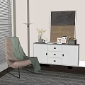 White Modern Entryway Cabinet Sideboard with Vase Photo Frames Green Blanket Chair and Sunlit Window